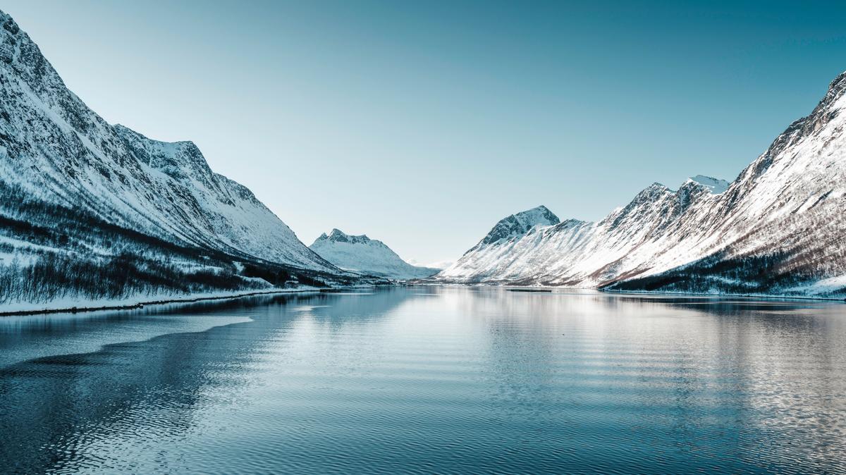 Lyngenfjord Norway with snow-covered mountains in winter